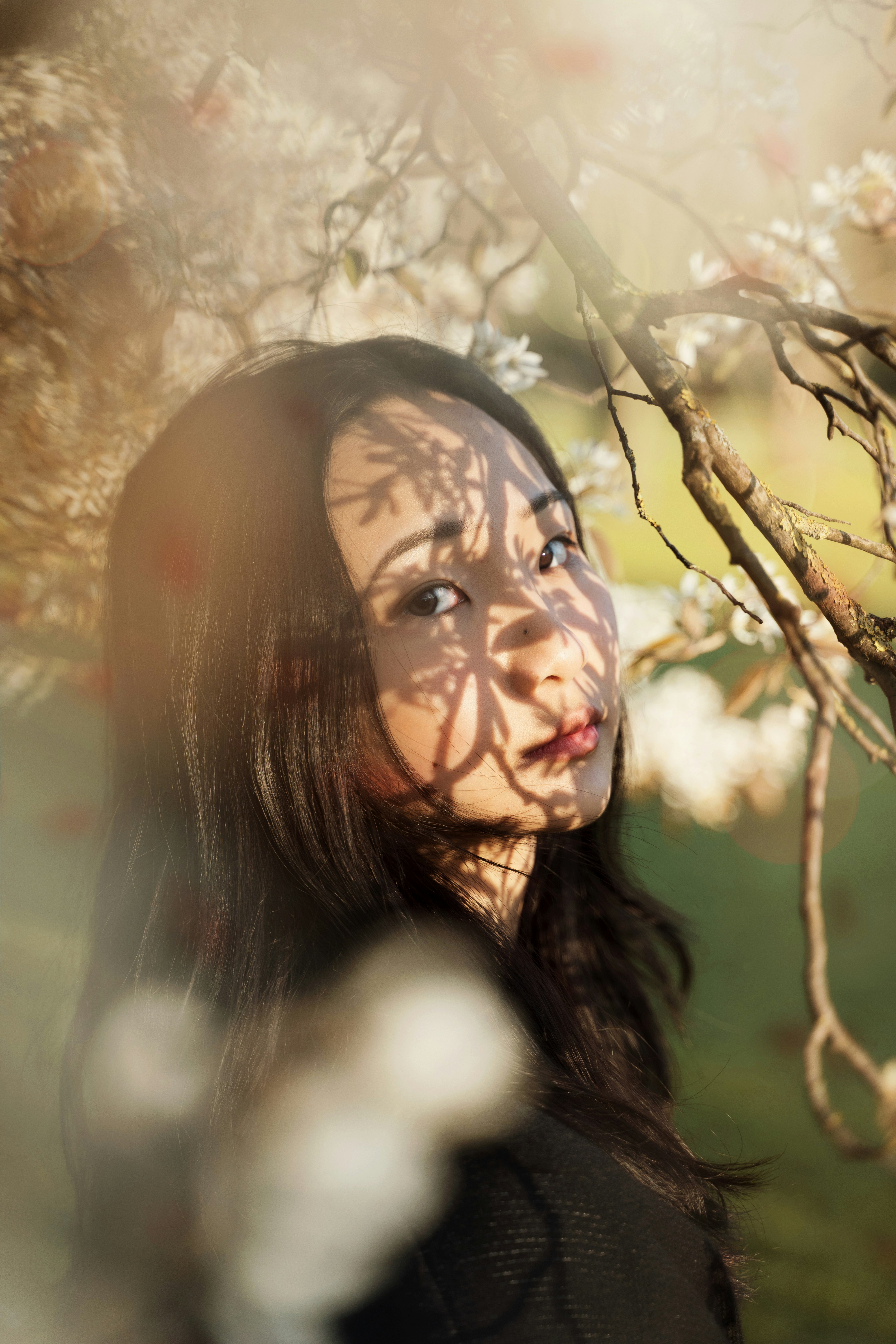 woman with black hair and blue eyes